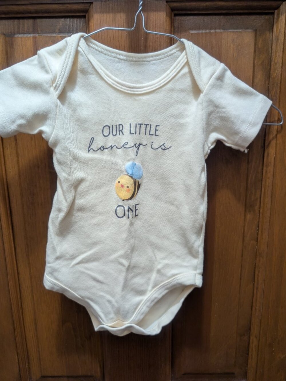Baby short sleeve bodysuit "Our little honey is ONE." size 12 months; NWOT